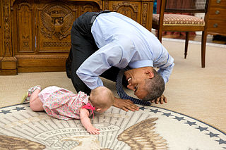 Barack Obama crawling with Ella Rhodes